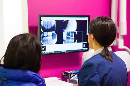 Dr. Ciano from Montgomery Pediatric Dentistry in Princeton, NJ reviews x-rays to see if any cavities that need tooth fillings are needed.